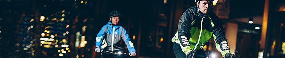 City cyclists wearing high visibility jackets City cyclists wearing high visibility jackets